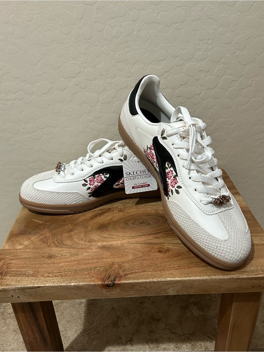 NWT Skechers Women's White Sneakers with Black Panels and Pink Floral Embroidery